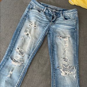 Women’s size 8 light wash distressed AE jeans.